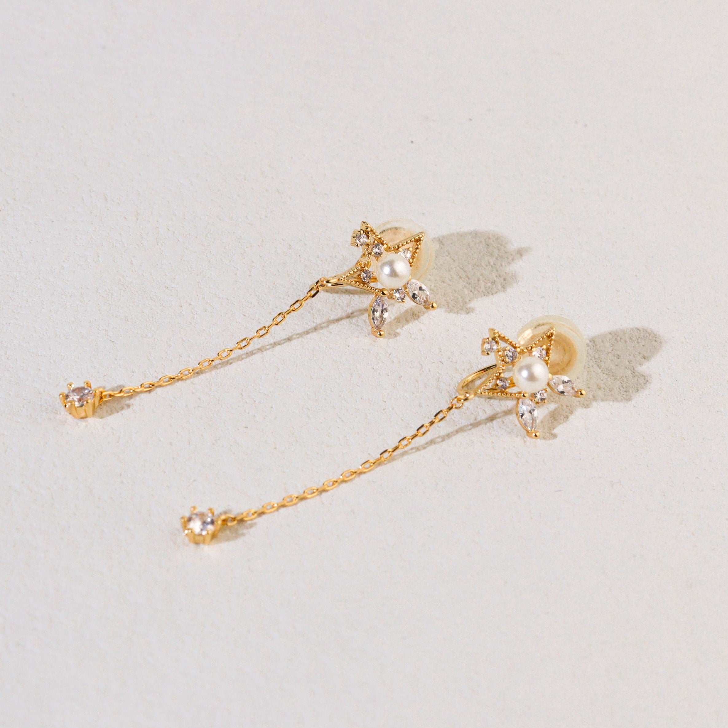 Fetching Meteor Gold Clip On Earrings