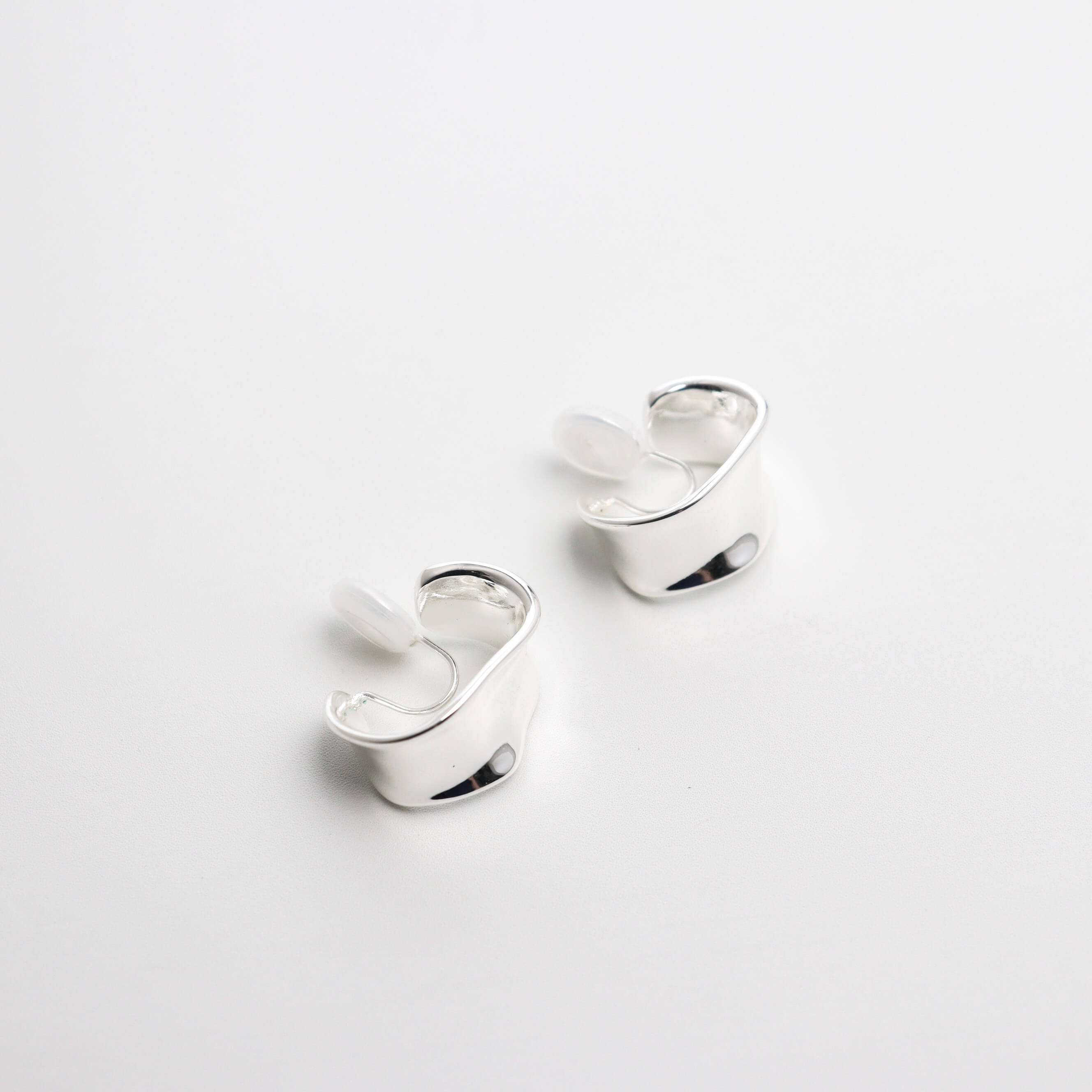 Reflector Silver Clip On Earrings