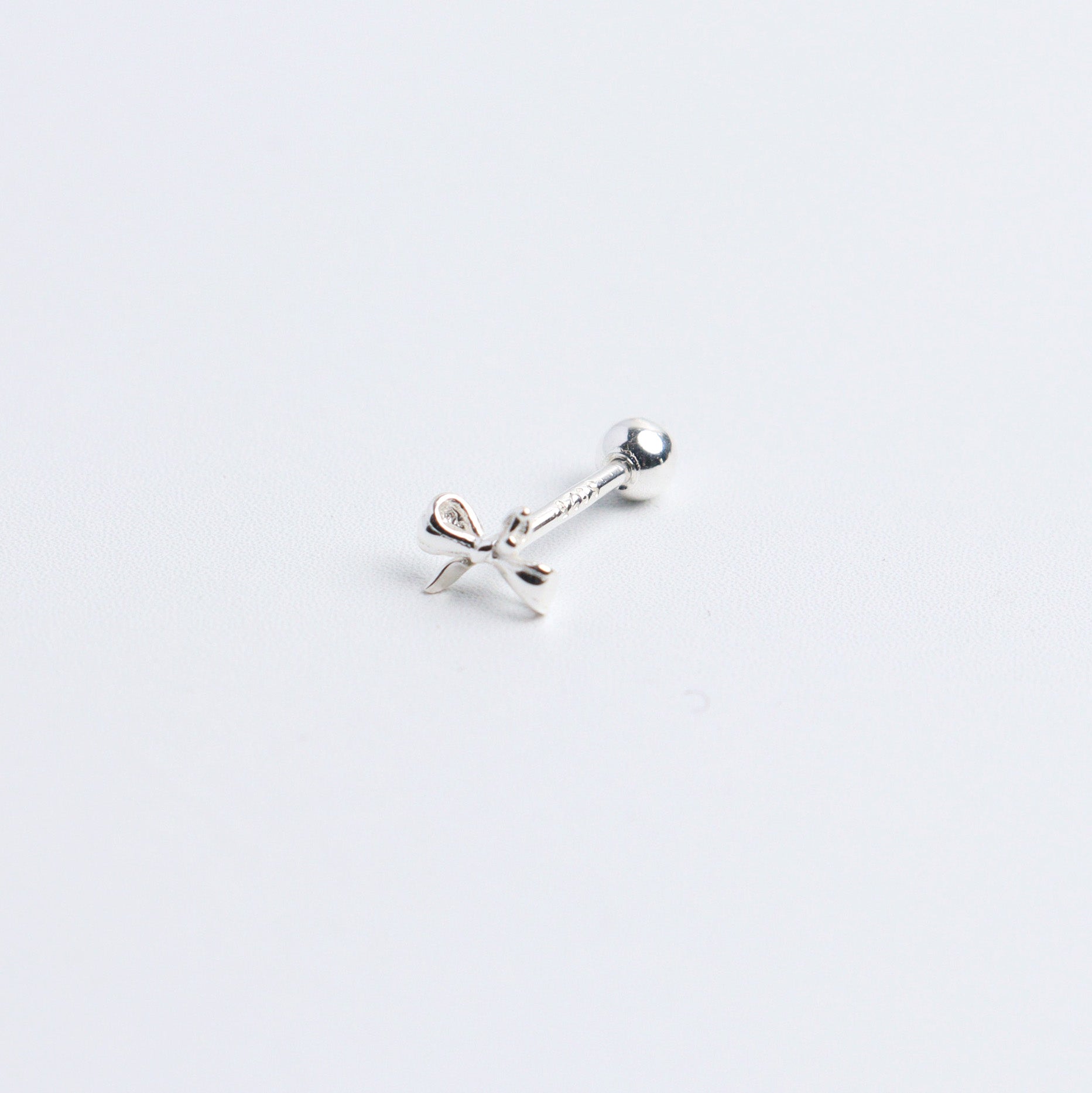 Tiny Ribbon Silver Stud Earrings