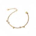 Entangled Heart Chain Gold Bracelet