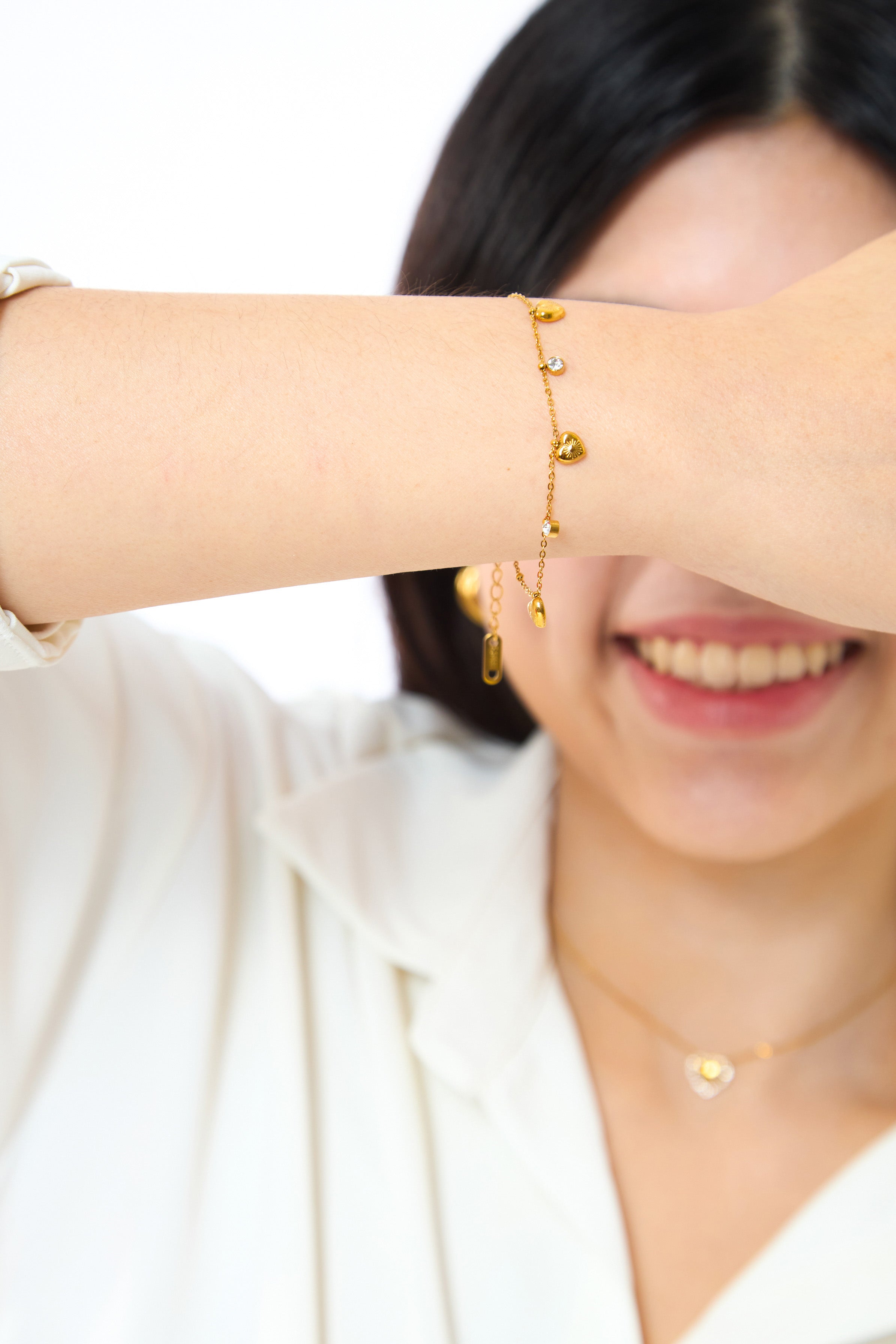 Graceful Hearts Gold Bracelet