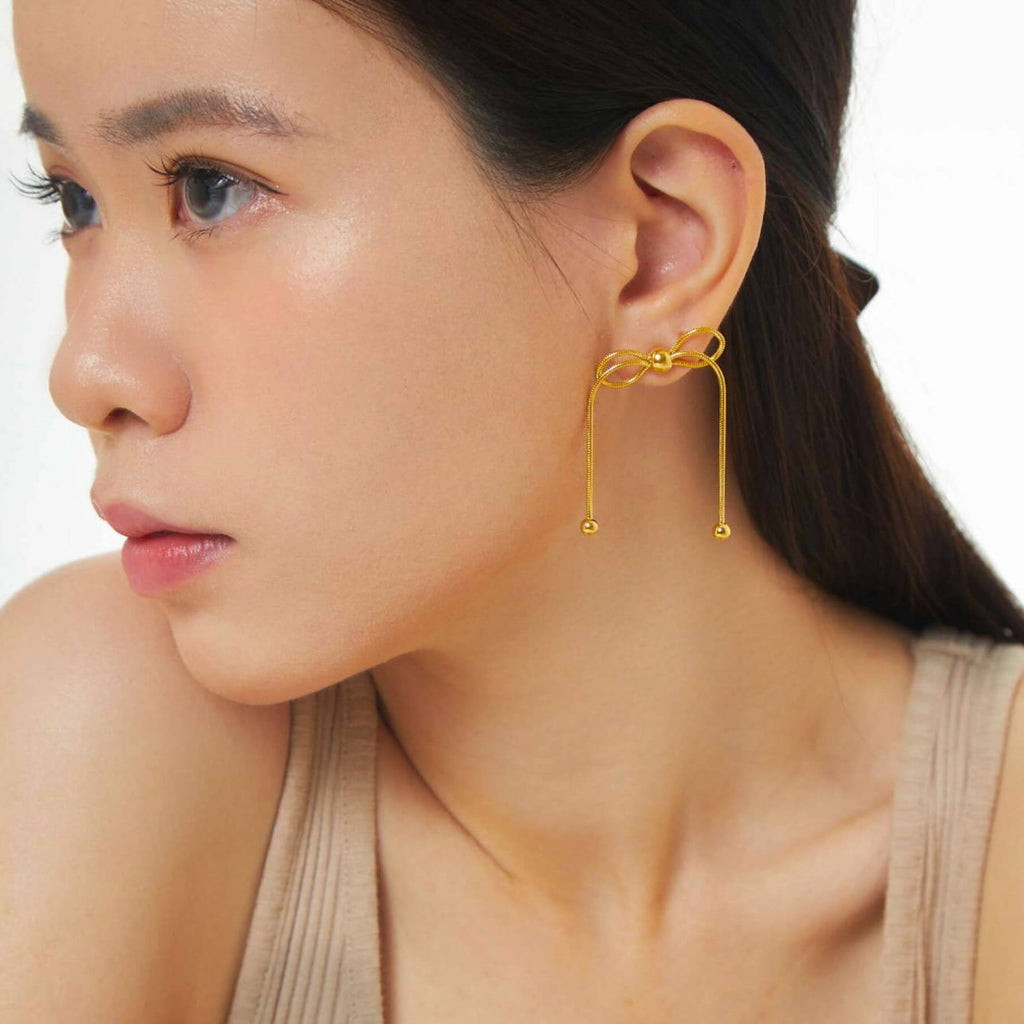 Dancing Bow Gold Earrings