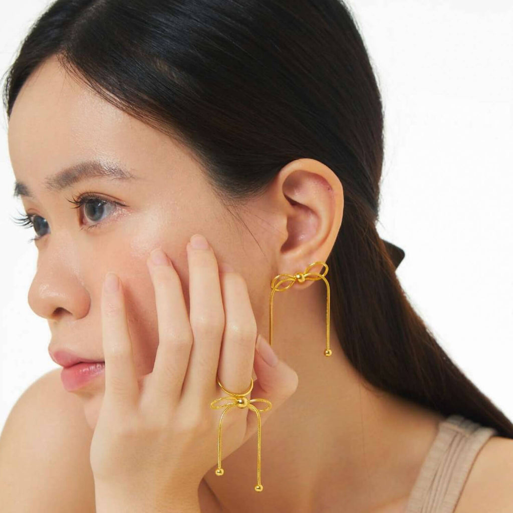 Dancing Bow Gold Earrings