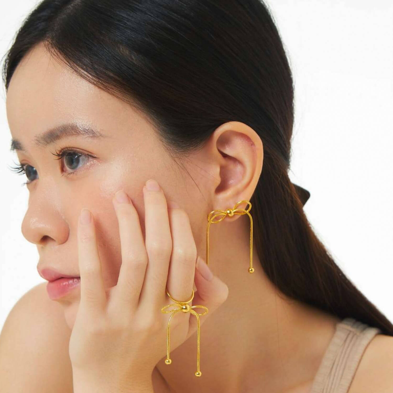 Dancing Bow Gold Earrings