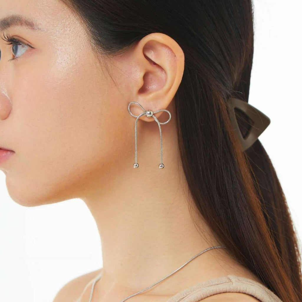 Dancing Bow Silver Earrings