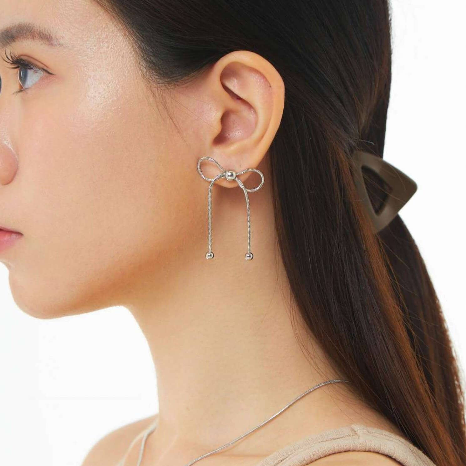 Dancing Bow Silver Earrings