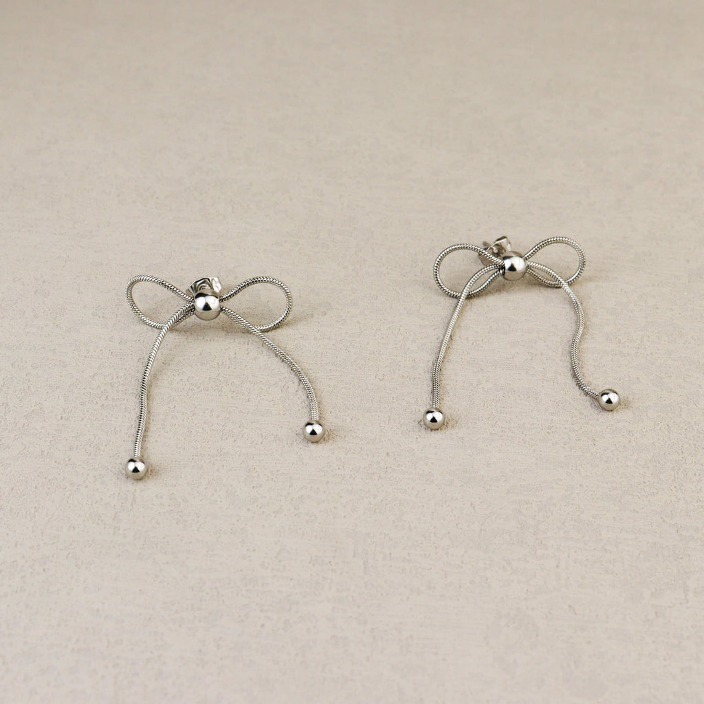 Dancing Bow Silver Earrings
