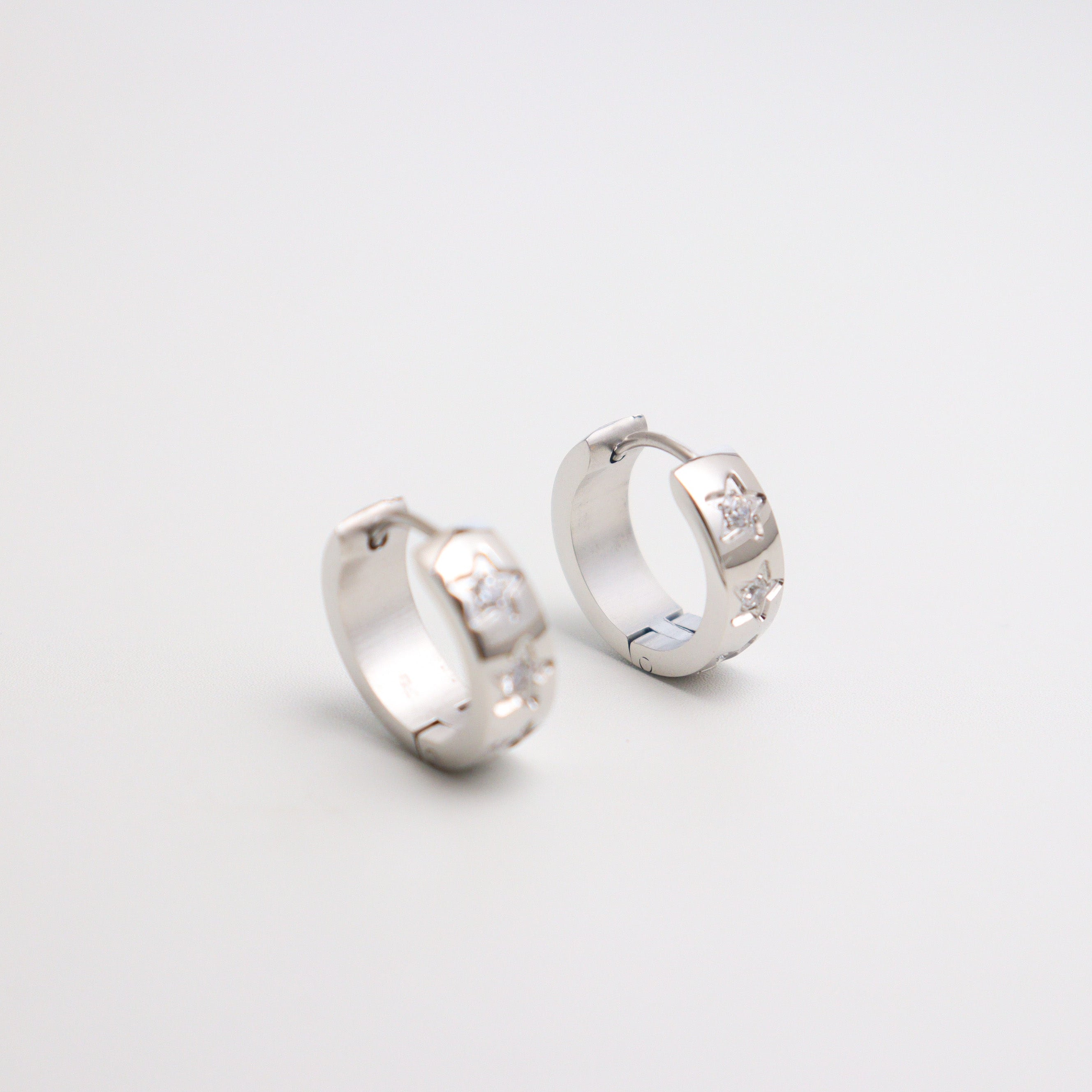 Collective Stars Silver Huggies Earrings