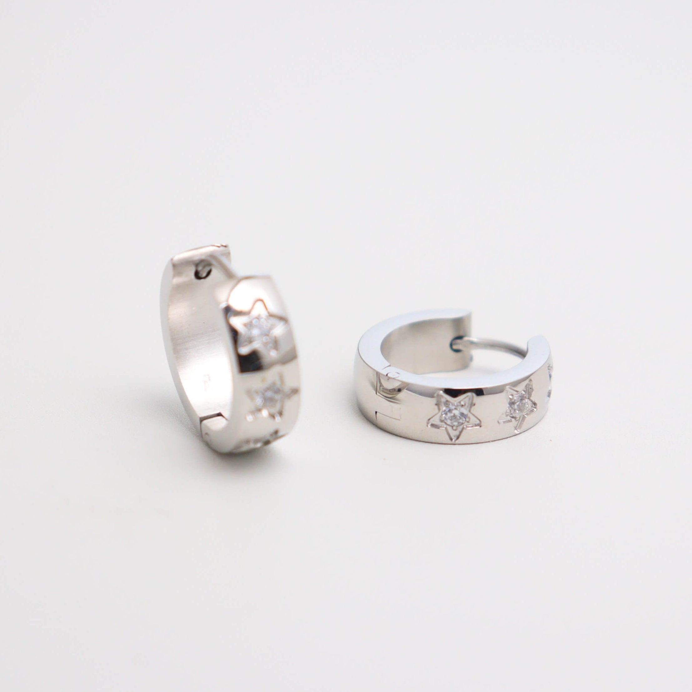 Collective Stars Silver Huggies Earrings
