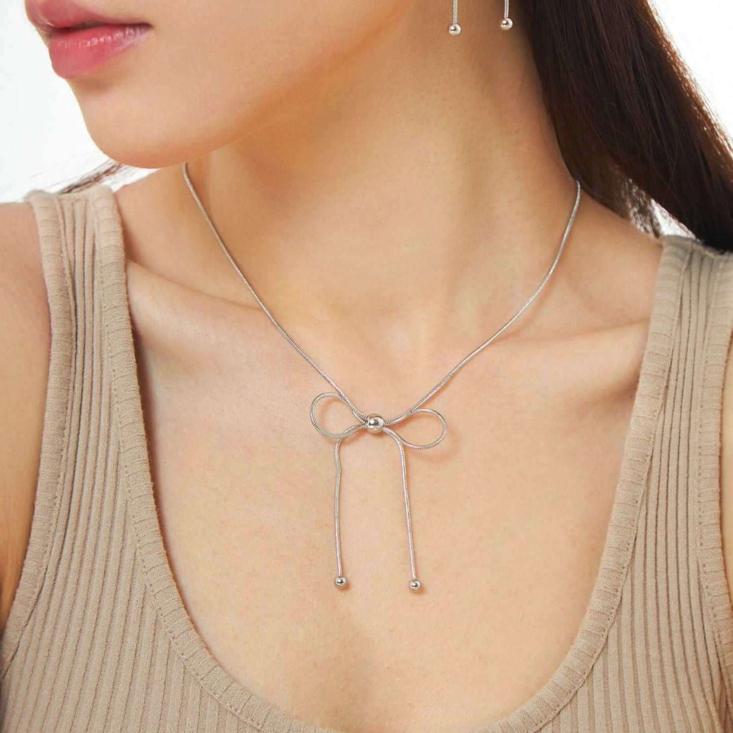 Dancing Bow Silver Necklace