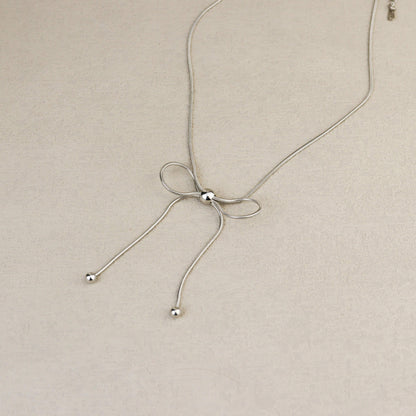 Dancing Bow Silver Necklace