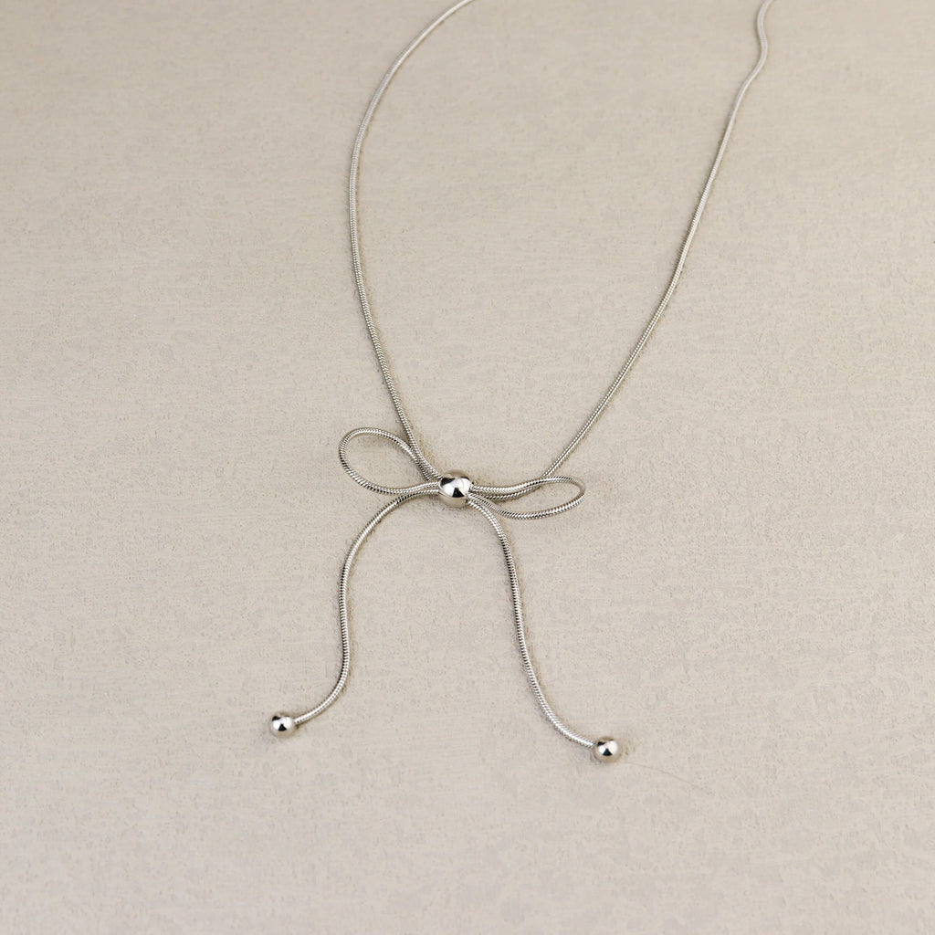 Dancing Bow Silver Necklace