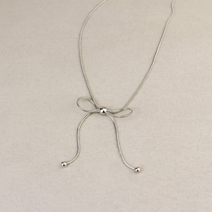 Dancing Bow Silver Necklace