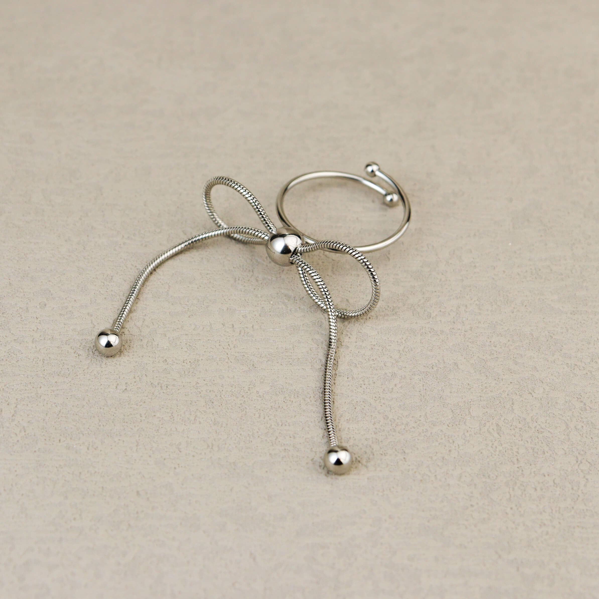 Dancing Bow Silver Ring