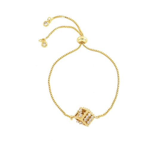 zirconia gold dice on gold bracelet